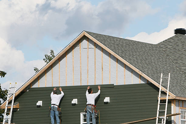 Professional Siding Replacement technician working in Gracewood, GA